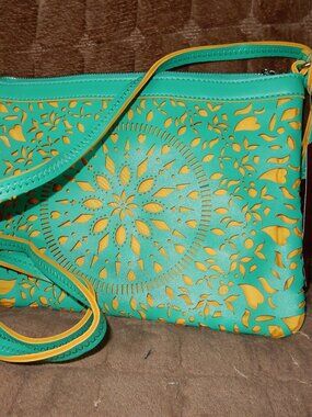 Carlos Santana crossbody
